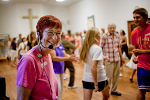 Gail Hintze from Chillicothe is the caller at the Barn Dance at the Edelstein Congregational Church,
 a fun family event with a great live band.