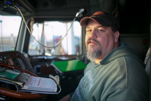 Dan Dailey of Morrisonville has been a truck driver for 22 years, his current truck is the 3rd one he has owned.  At times 
he is gone 3 months at a time. 'I hate everyday of it' he said 'I am only doing this until something better come along.'