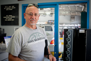 Chuck Ames of Peoria is a retired teacher, he works for Renaissance Learning 
and travels across the U.S. teaching teachers. Today, he is getting an oil change.