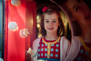 Samantha Skowronski (age 5) is watching the Jellyfish at the Shedd Aquarium. She starts back at school Monday,
 so she is spending the last day of her Christmas break at the aquarium.