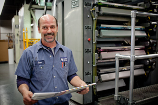 John Vanderheydt is a press operator at P&P Press in Peoria, IL. He has been in the printing business for 20 years.
 He says he enjoys his job, ‘it’s in my blood’.