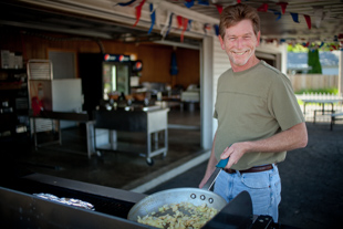 Mathew Ingraham is on the grill at Northside Grill and Smokehouse part of Echo Valley Meats. He moved here from Maine two years ago and moved from selling seafood to now selling Meat.