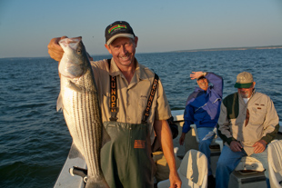 Mickey Rose has run a fishing guide service in Kingston, OK for the last 21 years he is a 4th generation Kingston resident. 
On being a fishing guide Mickey says, 'It is fun being around while people are having fun... and we have lots of fun'.