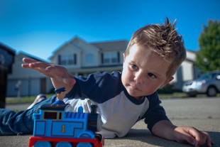 Braden Matthews is 20 months old. According to his mom, Jenna, he loves trains and being outside.
 So he was especially glad when Peoria's morning rain went away.