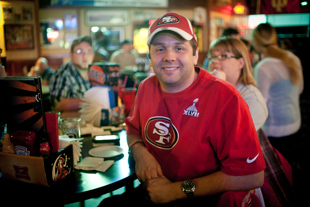 Nick Lentz has been a 49er fan since the Joe Montana days. He has been planning to watch Super Bowl XLVII 
with friends at Joes Peoria for a few weeks. He is hoping for a San Francisco win, predicting a score of 28-23.