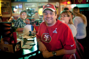 Nick Lentz has been a 49er fan since the Joe Montana days. He has been planning to watch Super Bowl XLVII 
with friends at Joes Peoria for a few weeks. He is hoping for a San Francisco win, predicting a score of 28-23.