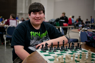 Michael Najera is a junior on the Plainfield, IL high school chess team who is competing in the state 
chess finals in Peoria this weekend. He said the reason he likes playing chess is the challenge 
of many different strategies and always having to think ahead.