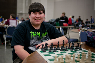 Michael Najera is a junior on the Plainfield, IL high school chess team who is competing in the state 
chess finals in Peoria this weekend. He said the reason he likes playing chess is the challenge 
of many different strategies and always having to think ahead.