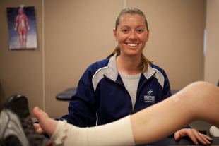 Cathy Wells is a Physical Therapist Assistant and a Sports Trainer. She has always been interested 
in sports and played sports in school. She said sports medicine was a natural fit for her.