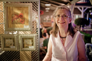 Julie K. Purdum has been painting for more than 40 years. She paints 6 days a week. Her mother always said she was born with a crayon in her hand. Today she was showing on the boardwalk at Junction City Shopping center in Peoria.