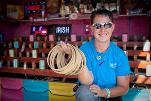 Ashley Haley is at the Steamboat Days Festival Carnival, this is her 8th year doing carnival work.
 She works all the games but likes the 'break a bottle' game the best,
 'cause I can talk all the crap I want and nobody gets mad'.