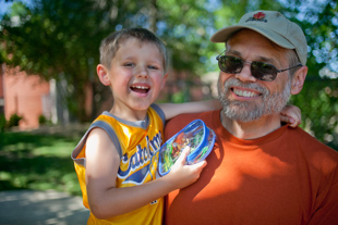 Don Klemme and his 5 year old grandson Kyler Mann, both from Bloomington IL, are spending father’s day at the Peoria Zoo.
  Don loves spending time with Kyler and Kyler loves animals. Kyler said 'this was my best day ever'.