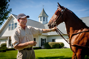 Mark Schofield is a trainer at Glenmore Farm in Edwards, IL.  He is with Brickell-Barnicus a 5 year old Hackney 
who is being trained to be a carriage horse. Both are originally from England.