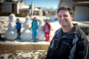 Dan Carey is spending some time playing in the snow with his and some neighborhood kids.
 ‘the first idea was to have a snowball fight, which turned into a better idea of building snow men’ he said.