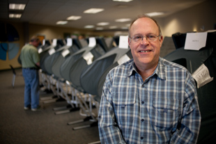 Mark Anderson is an election official for the City of Peoria. He took a vacation day from his job at Pella,
 to work the primary election today, because he 'just wanted to be involved in the process' he said.