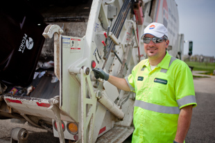 Scott Brady has driven a garbage truck for 6 years. ‘It is a job that needs to be done’ 
he said, ‘I take pride in helping to keep Peoria clean’.