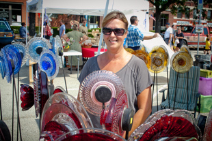 Angela Angle from Metamora is at her booth at The RiverFront Market called ‘Iris Eyes’.
 Angela creates beautiful garden sun catchers.