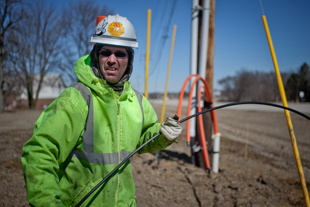 Craig Schoop has been a lineman for AT&T for 25 years. He said he is looking forward 
to spring weather so he can do some farming, ‘that’s what I do to relax’.